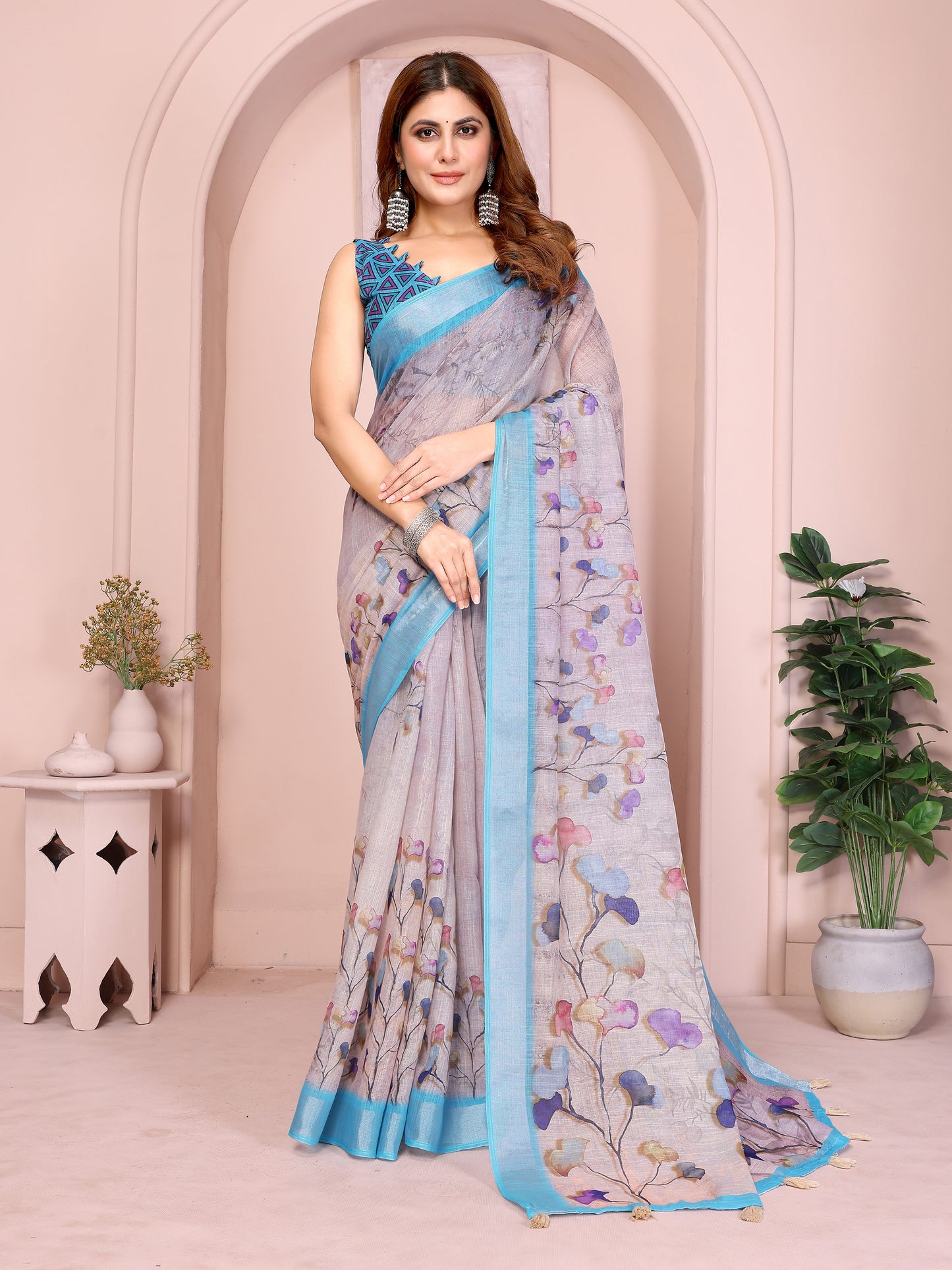 Women’s linen cotton floral printed saree with pastel colours turquoise border and matching blouse piece